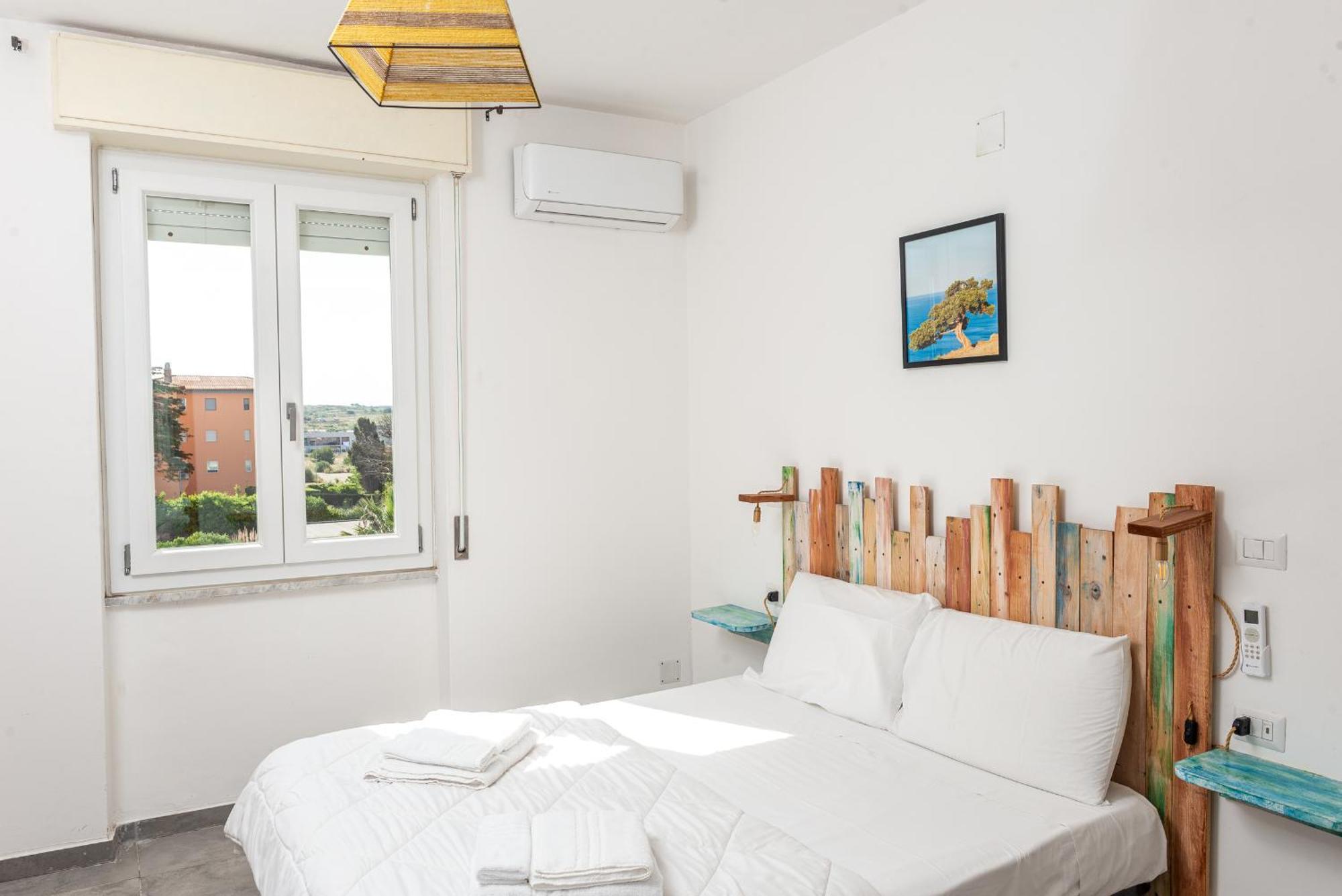 Guest House - Affittacamere Green Apartment - By Faendho Porto Torres Extérieur photo