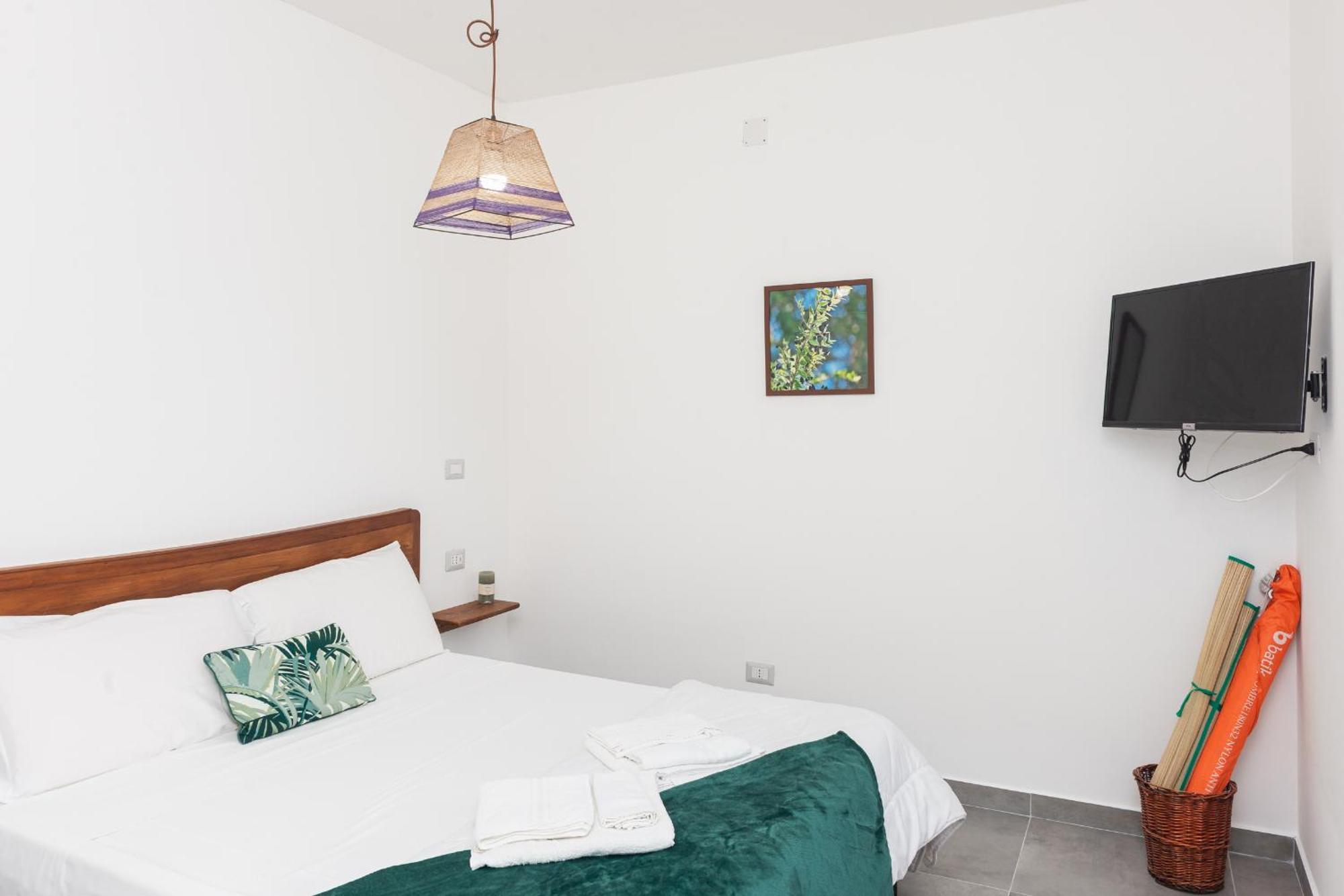 Guest House - Affittacamere Green Apartment - By Faendho Porto Torres Extérieur photo
