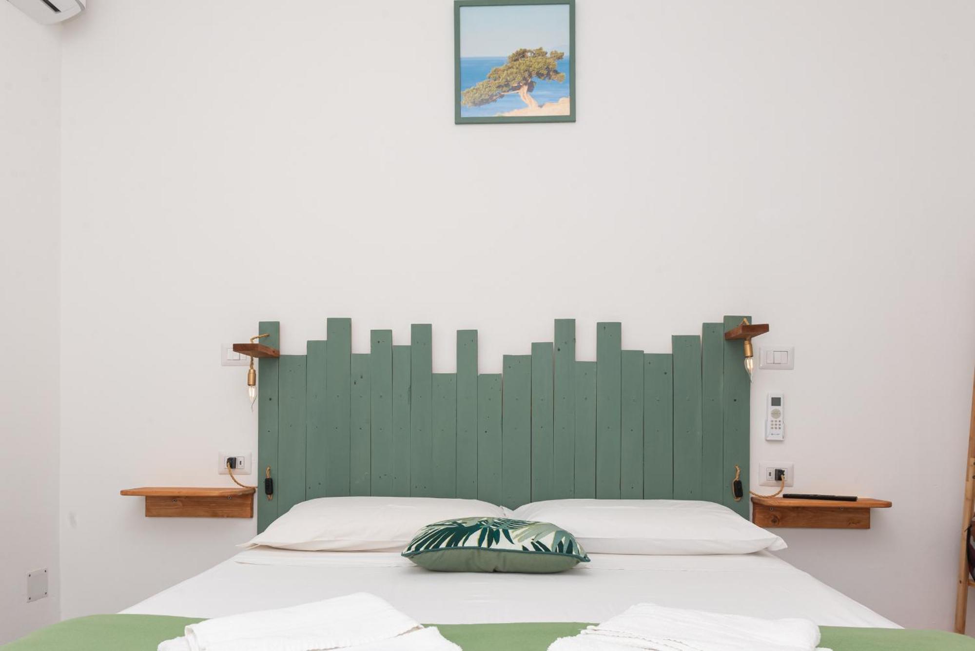 Guest House - Affittacamere Green Apartment - By Faendho Porto Torres Extérieur photo